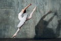 Ballerina female. Young beautiful woman ballet dancer, dressed in professional outfit, pointe shoes and white tutu. Royalty Free Stock Photo