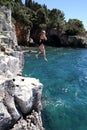 Jumping in the blue sea