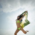 Jumping with Brazil flag on beach Royalty Free Stock Photo