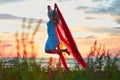 Jumping girl with red cloth Royalty Free Stock Photo