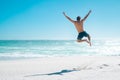 Jumping in joy for vacation Royalty Free Stock Photo