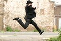 Jumping man with gun Royalty Free Stock Photo