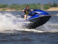 Jumping man on jet ski Royalty Free Stock Photo