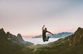 Jumping man in mountains vacations outdoor Royalty Free Stock Photo