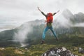 Jumping man in mountains vacations outdoor travel lifestyle adventure hiking vacations Royalty Free Stock Photo