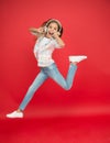 Jumping mid air. Happy small girl dancing. Cute child enjoying happy dance music. Music is happiness for her. Easy Royalty Free Stock Photo