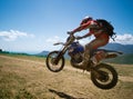 Jumping off-road rider Royalty Free Stock Photo