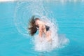 Jumping out of pool Royalty Free Stock Photo