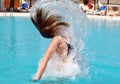 Jumping out of pool Royalty Free Stock Photo