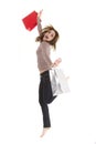 Jumping shopper woman