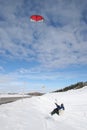 Jumping Snow Kiteboarder