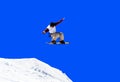 Jumping snowboarder Royalty Free Stock Photo