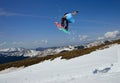 Jumping snowboarder Royalty Free Stock Photo
