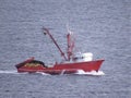 SARDINE FISHING BOAT JUMPING WAVES Royalty Free Stock Photo