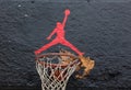 Jumpman logo by Nike on the basketball backboard