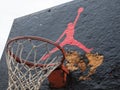 Jumpman logo by Nike on the basketball backboard