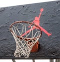 Jumpman logo by Nike on the basketball backboard