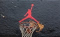 Jumpman logo by Nike on the basketball backboard