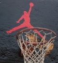 Jumpman logo by Nike on the basketball backboard