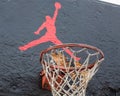 Jumpman logo by Nike on the basketball backboard