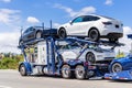 Jun 6, 2020 / CA / USA - Car transporter carries new Tesla Model Y on the upper level and Tesla Model 3 on the lower level