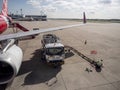 28 jun 20, Donmueng Airport, Bangkok, Thailand. Ground staff connect nozzle from truck and ground for aircraft refueling.