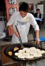 Jun Le, China: Cooking Chinese Pizza