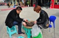 Jun Le, China: Couple Shelling Sunflower Seeds