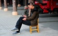 Jun Le, China: Man Using Cellphone