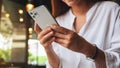 Jun 19th 2020 : A woman using Iphone 11 Pro Max smart phone , Chiang mai Thailand