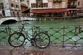 June 2, 2016 - Annecy, France : A bicycle leaning a rail by the river in the city