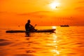 June 21, 2021. Antalya, Turkey. Man on stand up paddle board at ocean with bright sunset. Vacation on sup board in sea Royalty Free Stock Photo