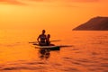 June 21, 2021. Antalya, Turkey. Woman with children paddle on stand up paddle board at quiet sea in evening. Woman and girl on Red Royalty Free Stock Photo