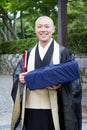 June 2012 - Arashiyama, Japan: A monk at the Tenryuji Temple temple looking at the camera and smile Royalty Free Stock Photo