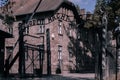 June 15 2022: Auschwitz, Poland. Main Entrance to Concentration Camp of Auschwitz Birkenau. Gate with German Slogan