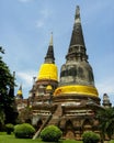 June 2011 Ayutthaya, Thailand - Buddhist temple with yellow cloth adorning the staues.