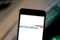 June 19, 2019, Brazil. In this photo illustration the British Airways logo is displayed on a smartphone Royalty Free Stock Photo