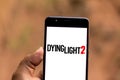 June 12, 2019, Brazil. In this photo illustration the Dying Light 2 logo is displayed on a smartphone