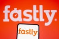 June 9, 2022, Brazil. In this photo illustration, the Fastly logo is displayed on a smartphone screen and in the background