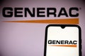 June 16, 2021, Brazil. In this photo illustration an Generac Holdings logo seen on a smartphone screen and in the background