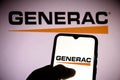 June 16, 2021, Brazil. In this photo illustration an Generac Holdings logo seen on a smartphone screen and in the background