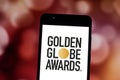 June 19, 2019, Brazil. In this photo illustration the Golden Globe Awards logo is displayed on a smartphone