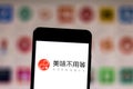 June 5, 2019, Brazil. In this photo illustration the Meiwei Buyongdeng logo is displayed on a smartphone