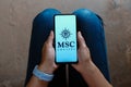 June 22, 2023, Brazil. MSC Crociere (MSC Cruises) logo is displayed on a smartphone screen