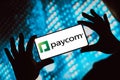 June 3, 2024, Brazil. The Paycom Software, Inc. logo is displayed on a smartphone screen Royalty Free Stock Photo