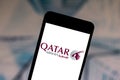 June 1, 2019, Brazil. In this photo illustration the Qatar Airways logo is displayed on a smartphone Royalty Free Stock Photo