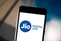 June 11, 2019, Brazil. In this photo illustration the Reliance Jio Infocomm Limited logo is displayed on a smartphone