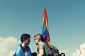 08 June 2019 Bulgaria Two people looking each other and holding a flag on Sofia Pride parade