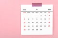 June 2022 calendar on pink background