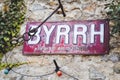 June 26, 2023, Castelnou, France - Metal plaque sign of the alcoholic beverage brand Byrrh
